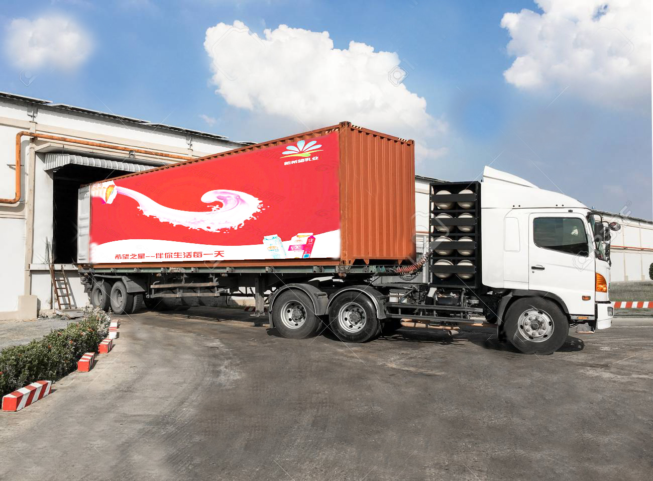 51288492-container-truck-loading-goods-at-warehouse.jpg